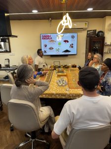 People attending a supper club in Delhi and sharing a curated dinner